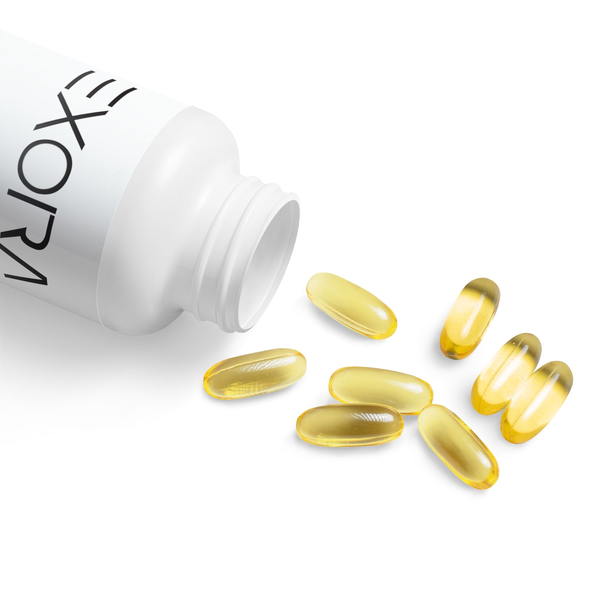 Yellow capsules spilling out of a white bottle labeled 'EXORA' on a white background