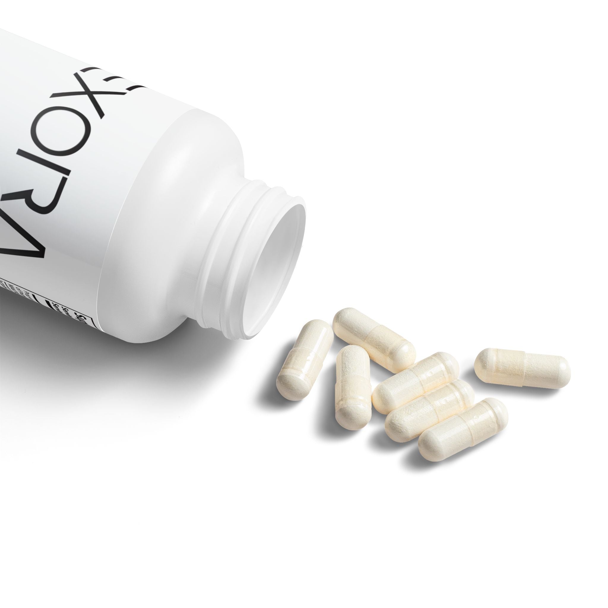 White bottle of 'EXORA' supplements with capsules spilling out on a white background