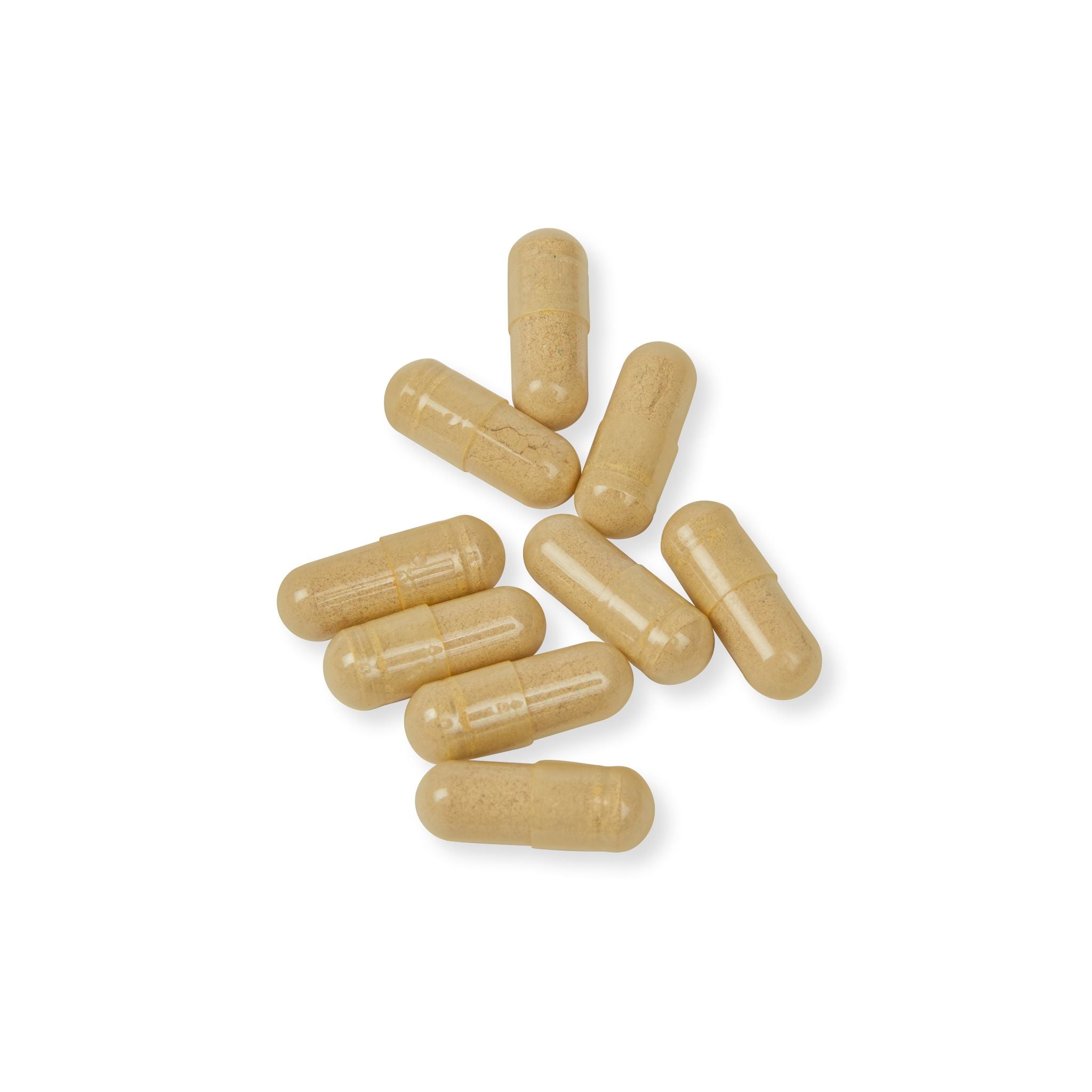 Beige capsules on a white background