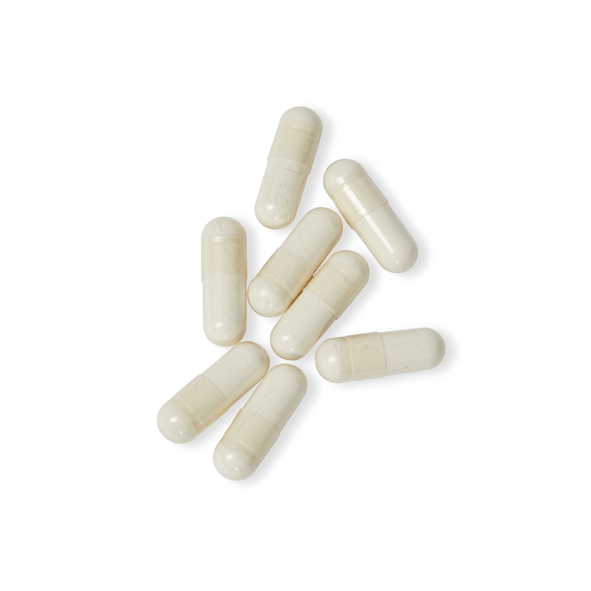 White capsules on a white background