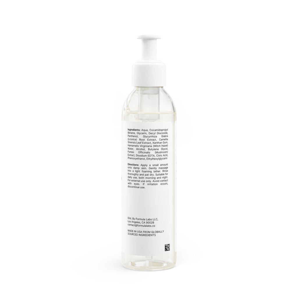 Clear bottle with a white pump on a white background