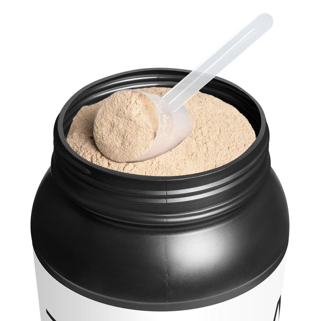 Black container of protein powder with a scoop inside, on a white background