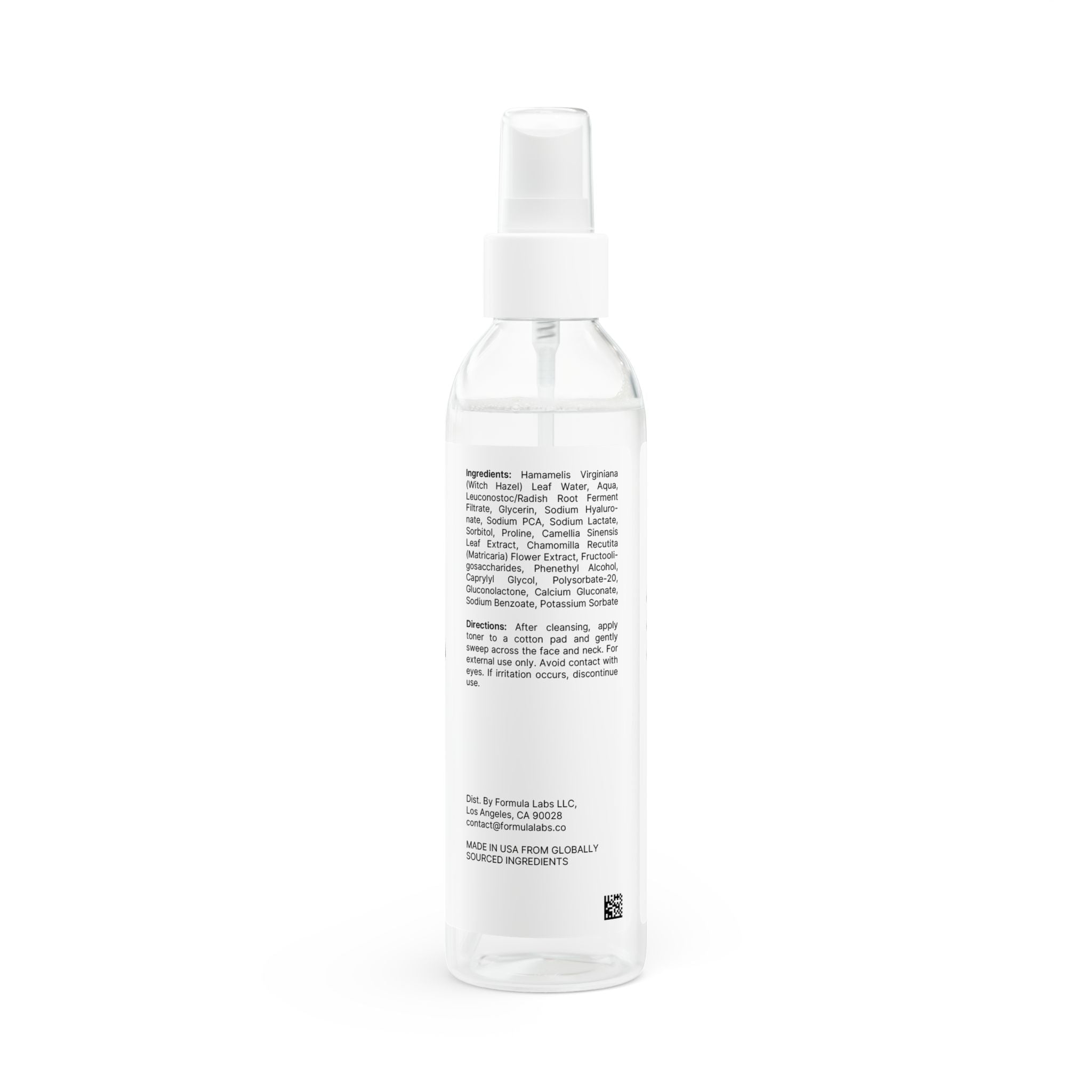 Clear spray bottle with a white label on a white background