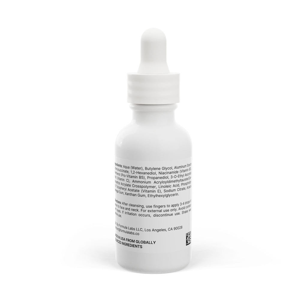 White dropper bottle with label on a white background