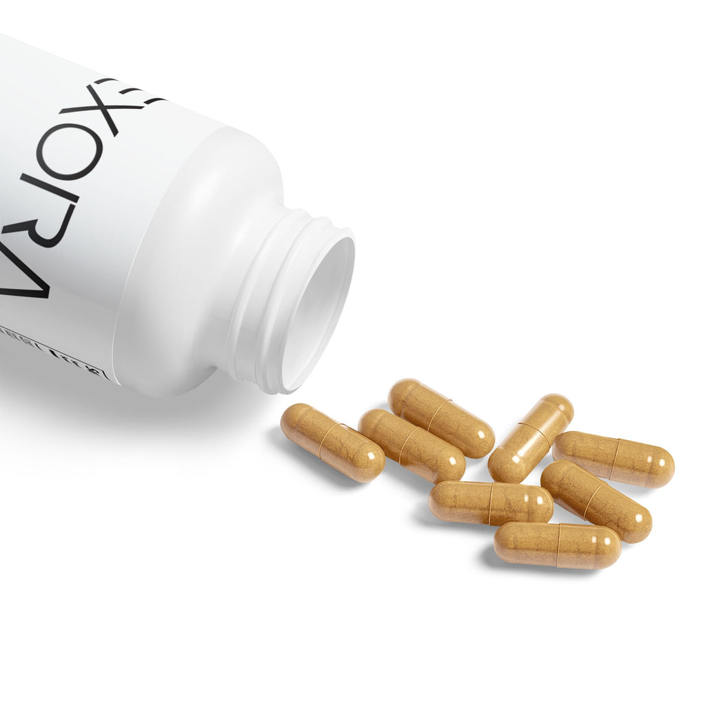 White bottle labeled 'EXORA' with brown capsules on a white background