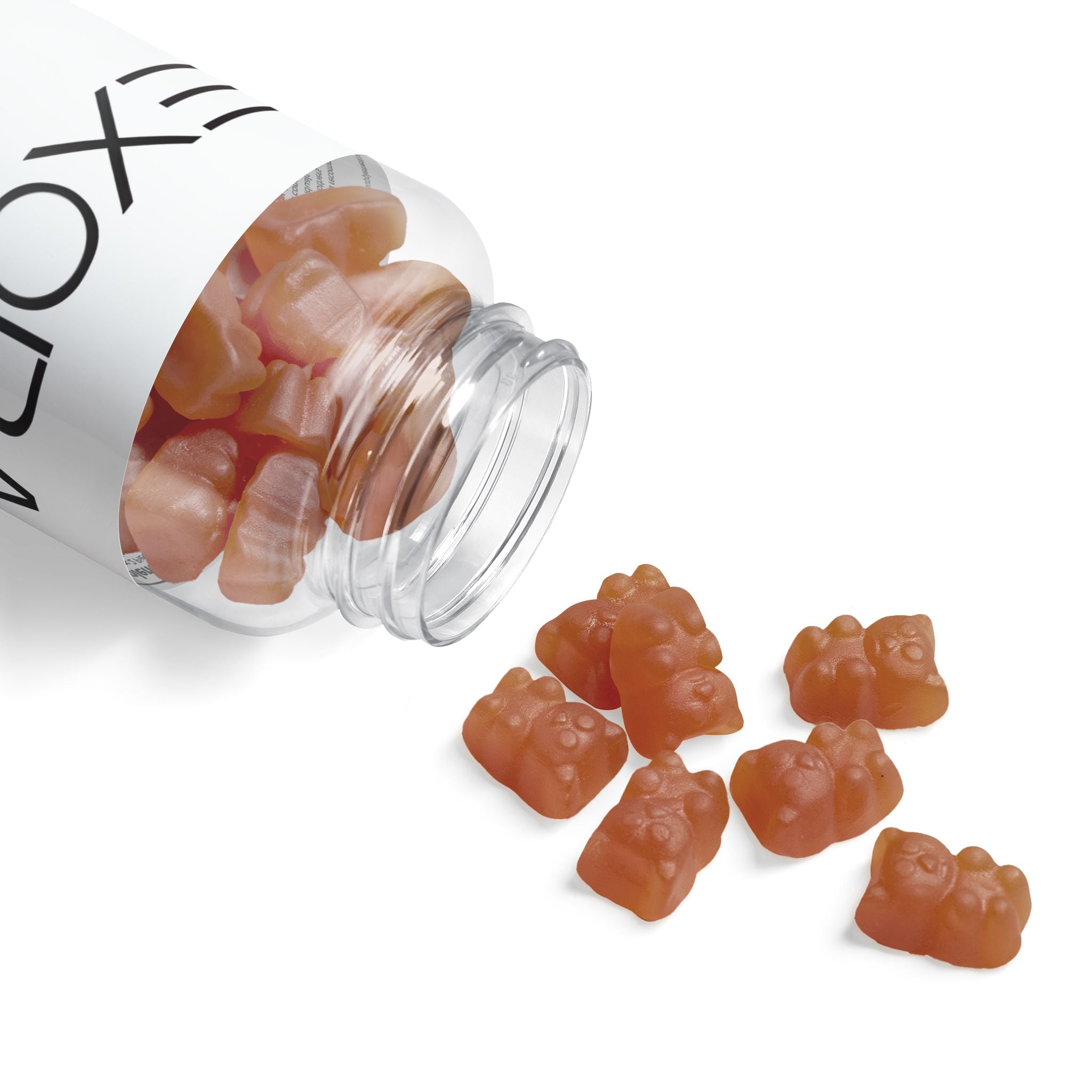 Clear jar with gummy bears spilling out onto a white background