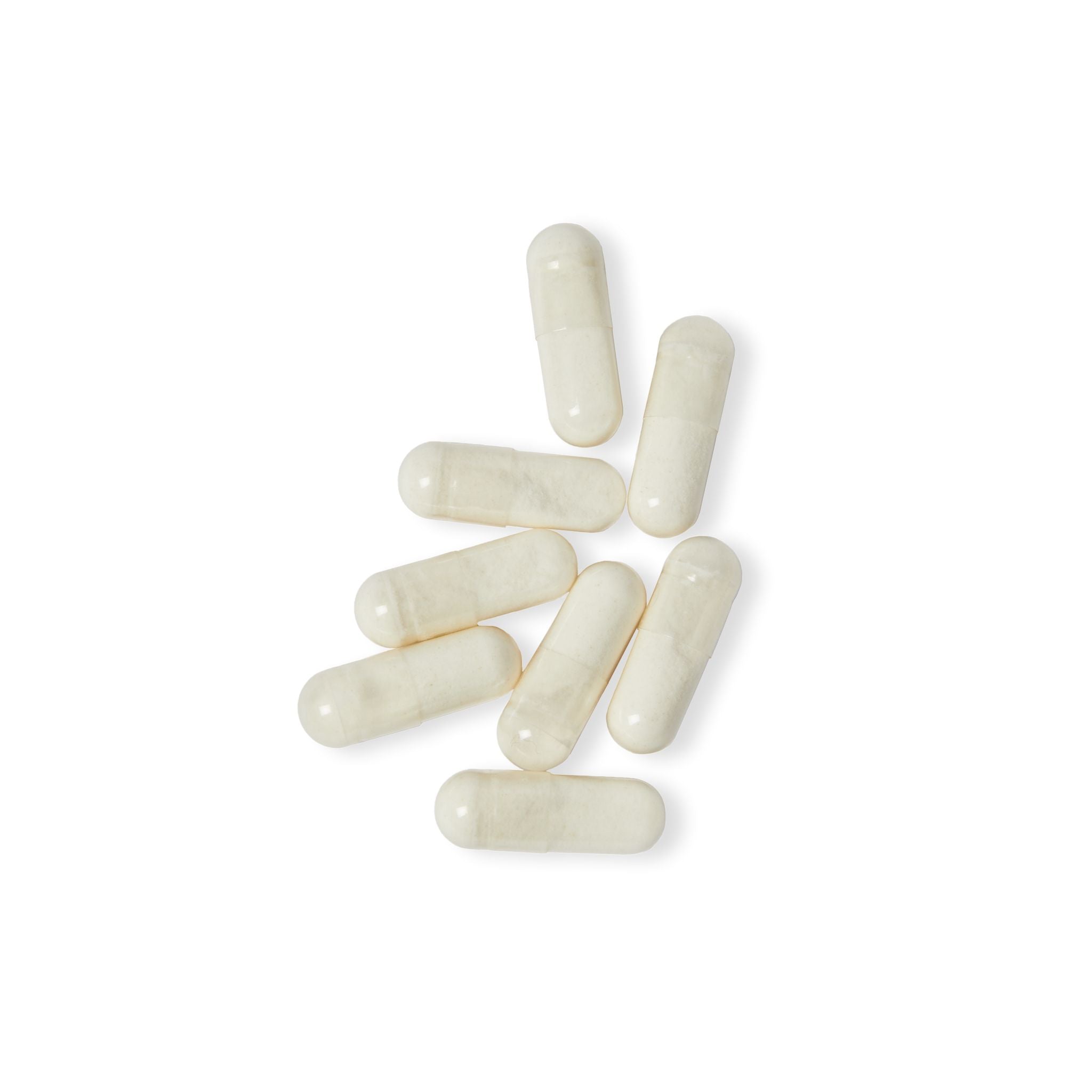White capsules on a white background